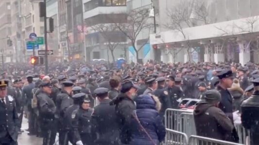 HONORING A HERO: Thousands of Cops Line Streets of Manhattan to Remember Fallen NYPD Officer
