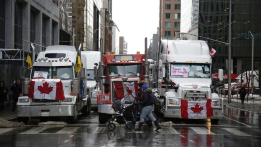 Police arrest 'Freedom Convoy' organizer in viral video as truckers dig in heels against mandates
