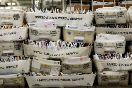 Outraged Democrats Pen Fiery Letter to Trump Over Talk of Reforming USPS